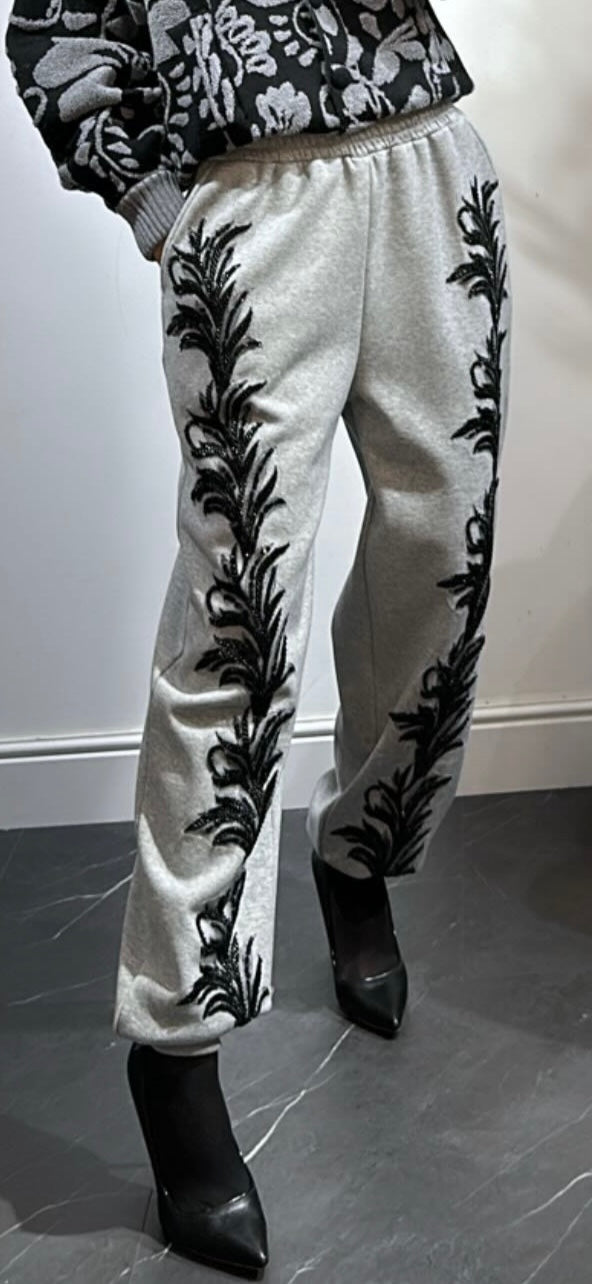 Pantaloni grigi tuta con corallini