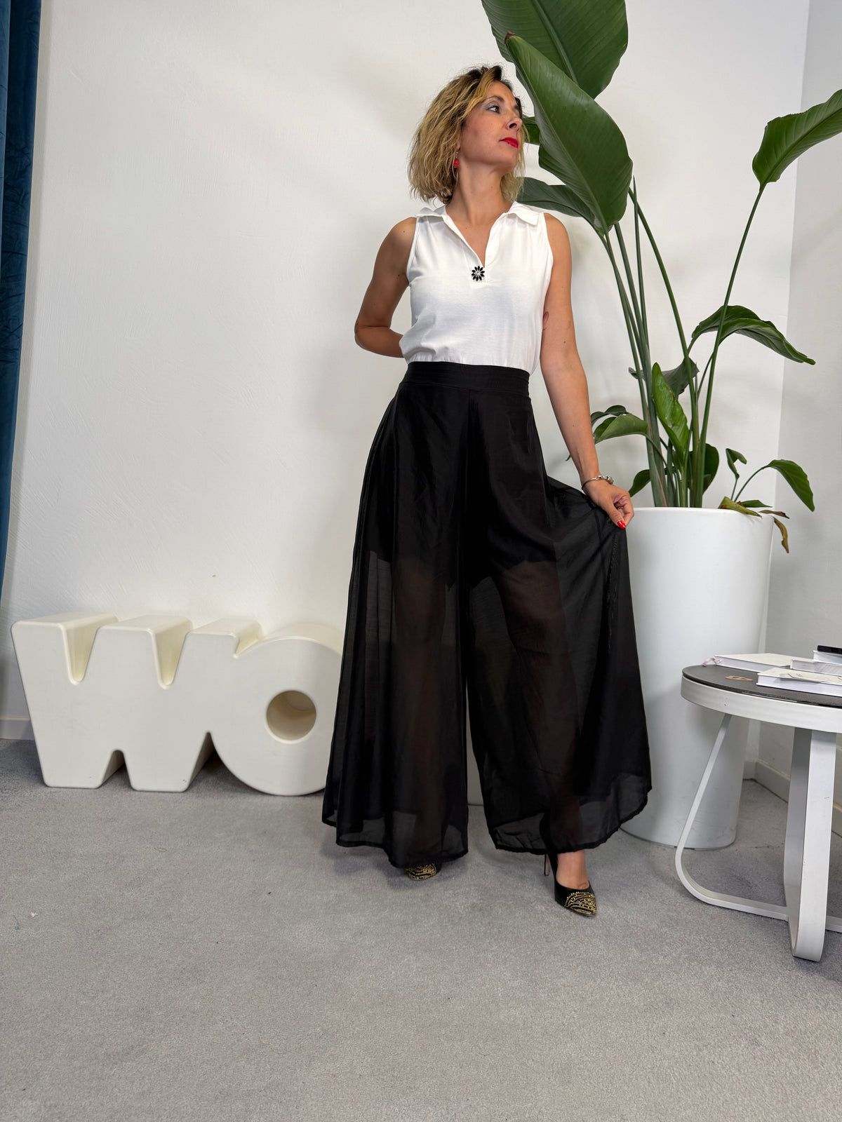 Pantaloni pantagonna neri semi trasparenti