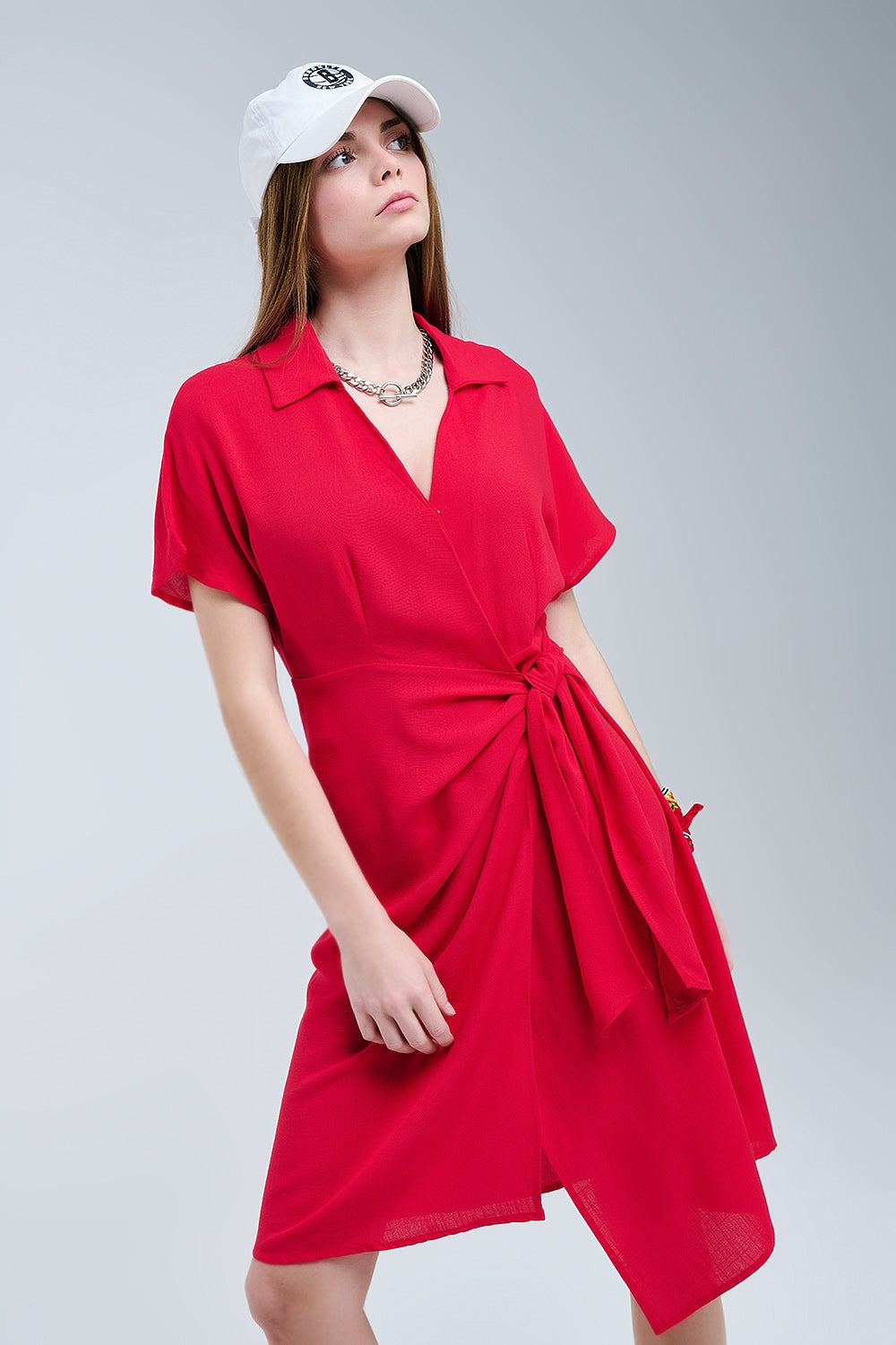 Abito midi rosso con fiocco laterale