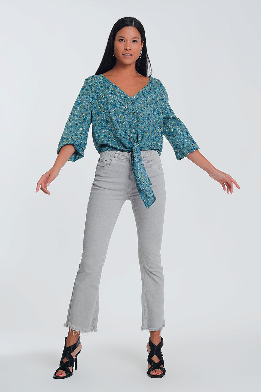 Blusa a maniche lunghe con scollo a V bottoni e stampa a fiori verde