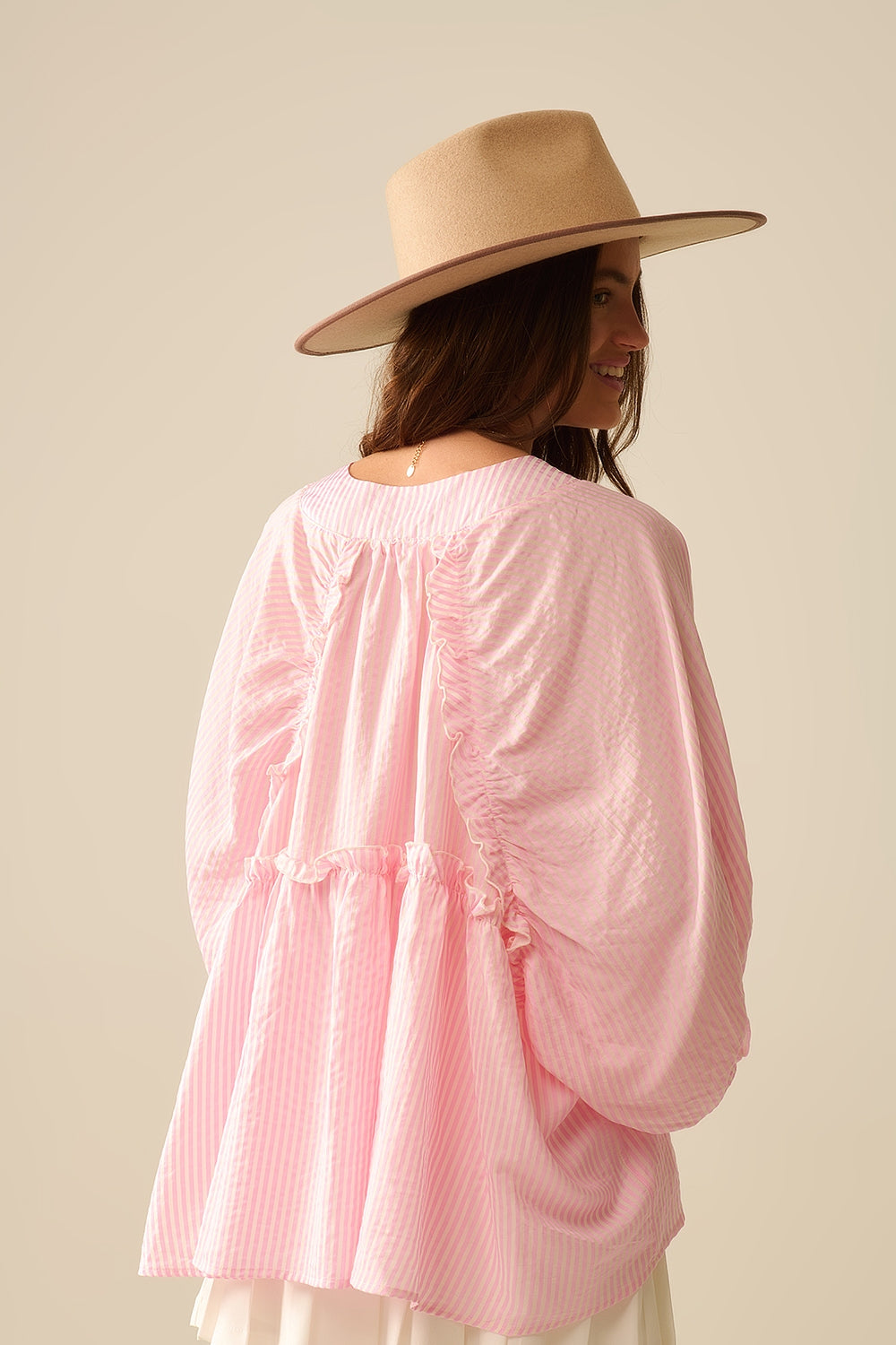 Blusa a righe con maniche a palloncino in rosa