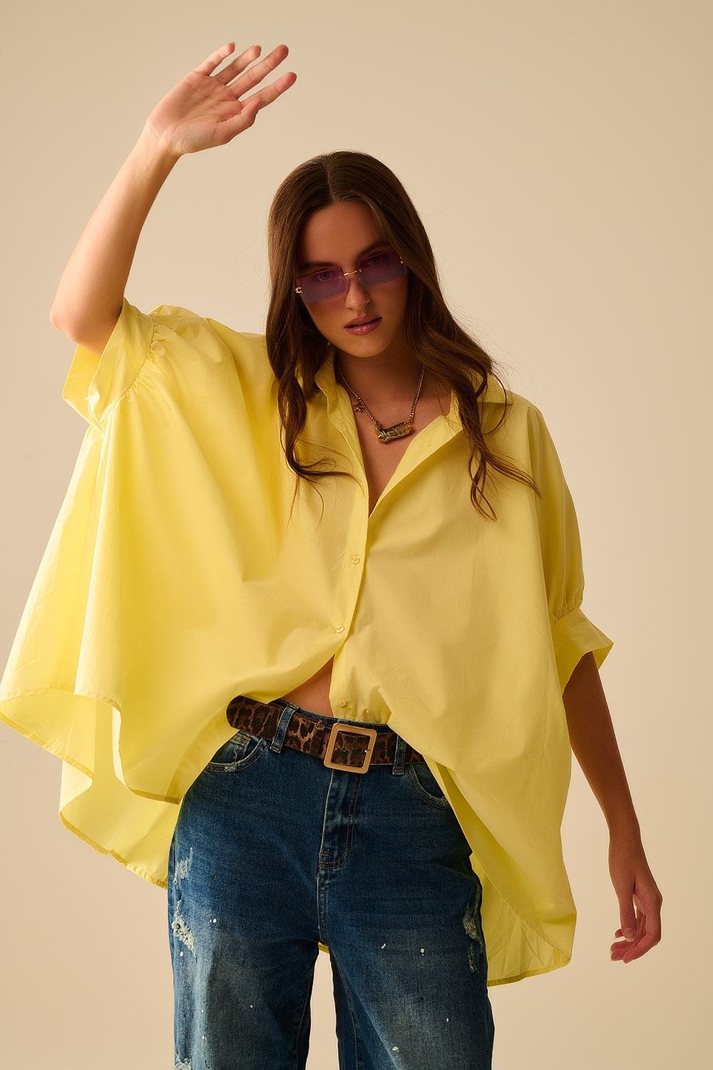 Blusa gialla oversize con manica corta