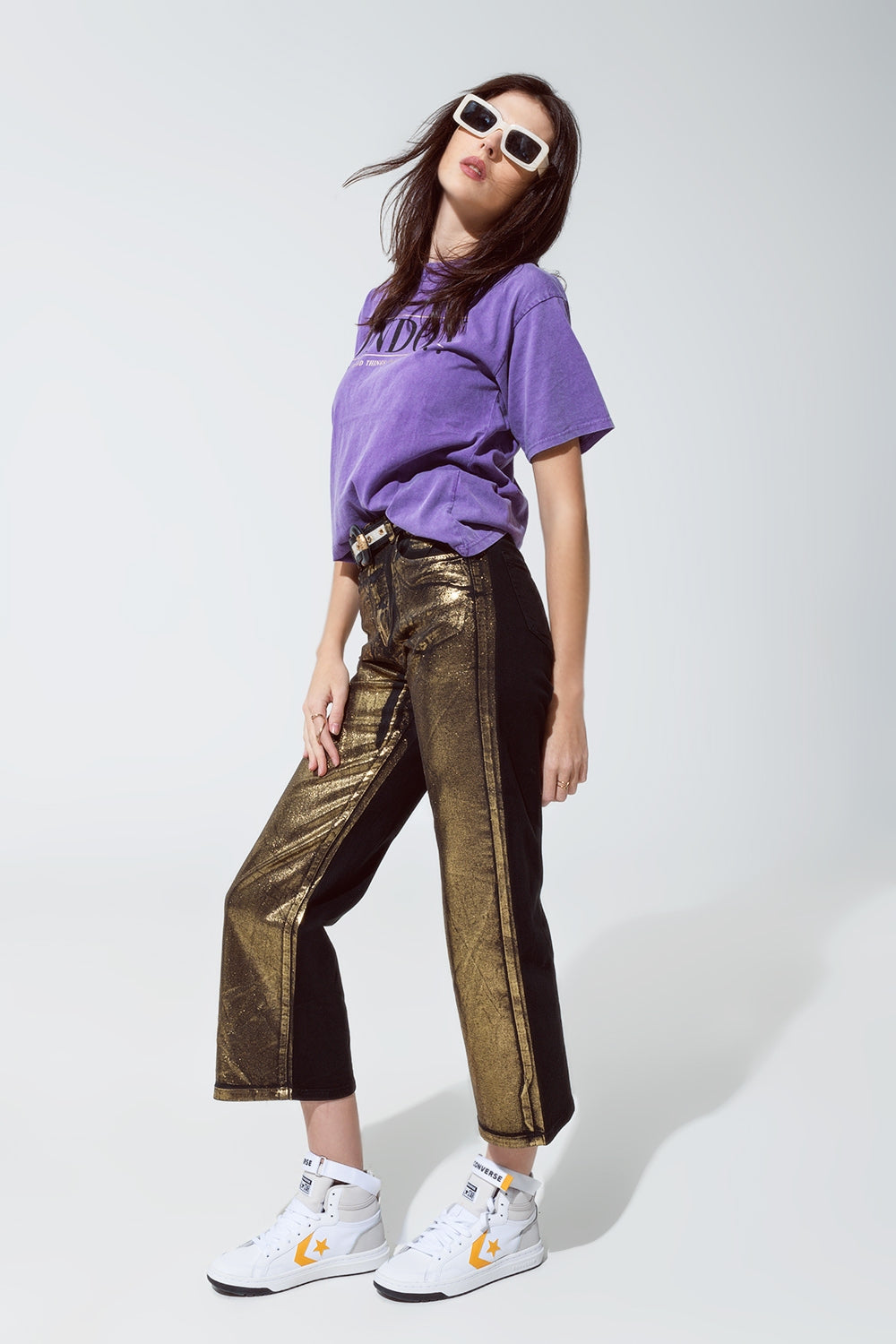 Jeans neri a gamba dritta con riflessi metallici dorati