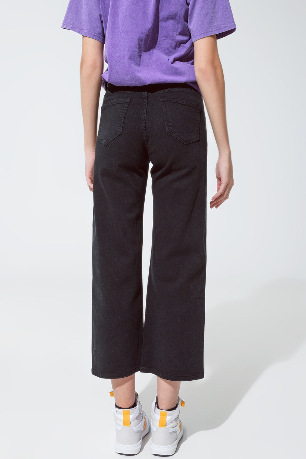 Jeans neri a gamba dritta con riflessi metallici dorati