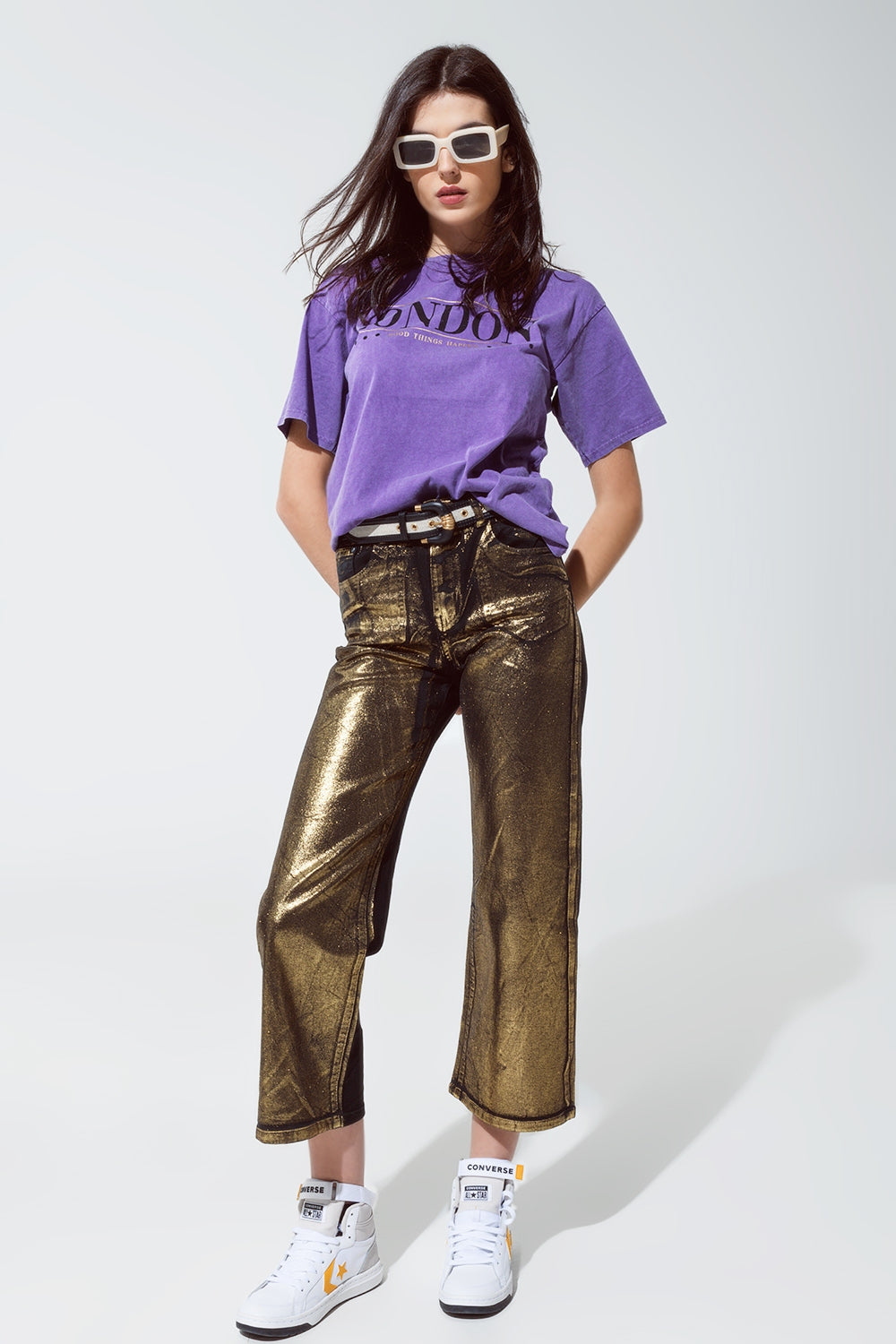 Jeans neri a gamba dritta con riflessi metallici dorati