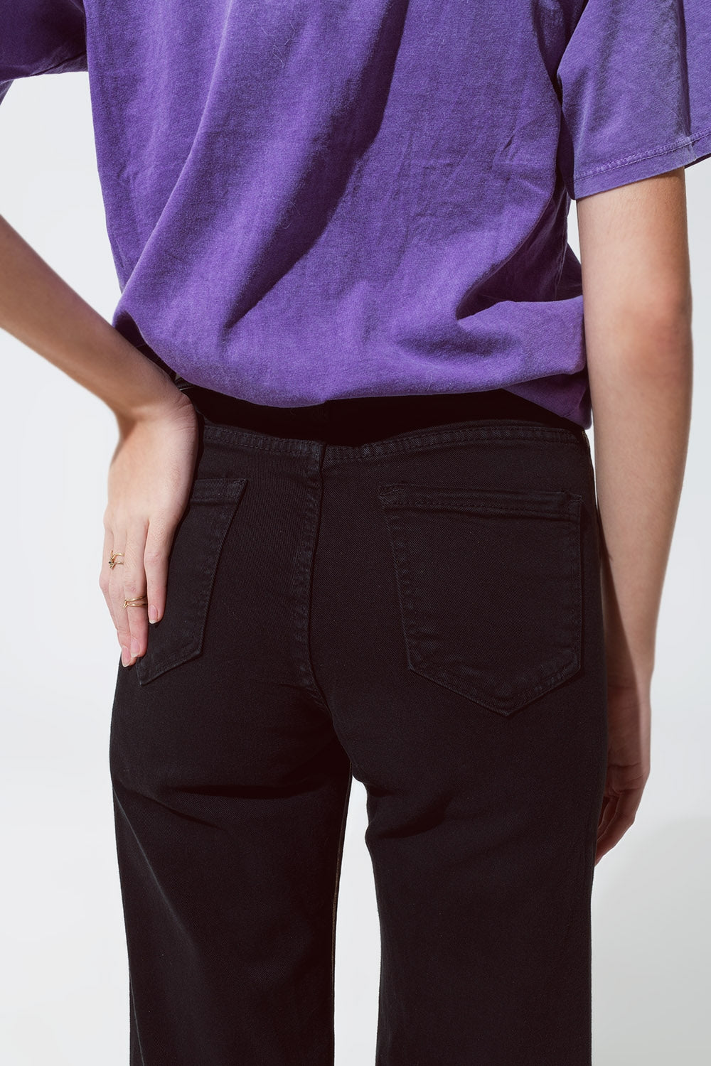 Jeans neri a gamba dritta con riflessi metallici dorati