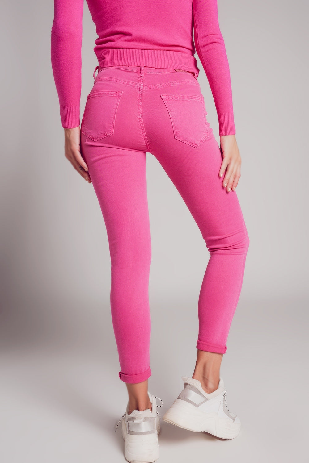 Jeans skinny a vita alta in fucsia