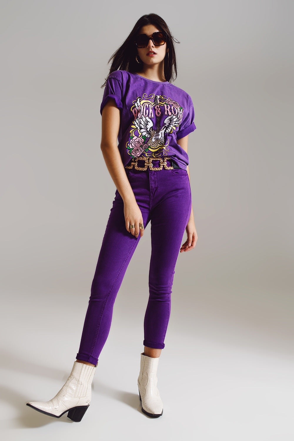 Jeans skinny alla caviglia viola con morbide rughe