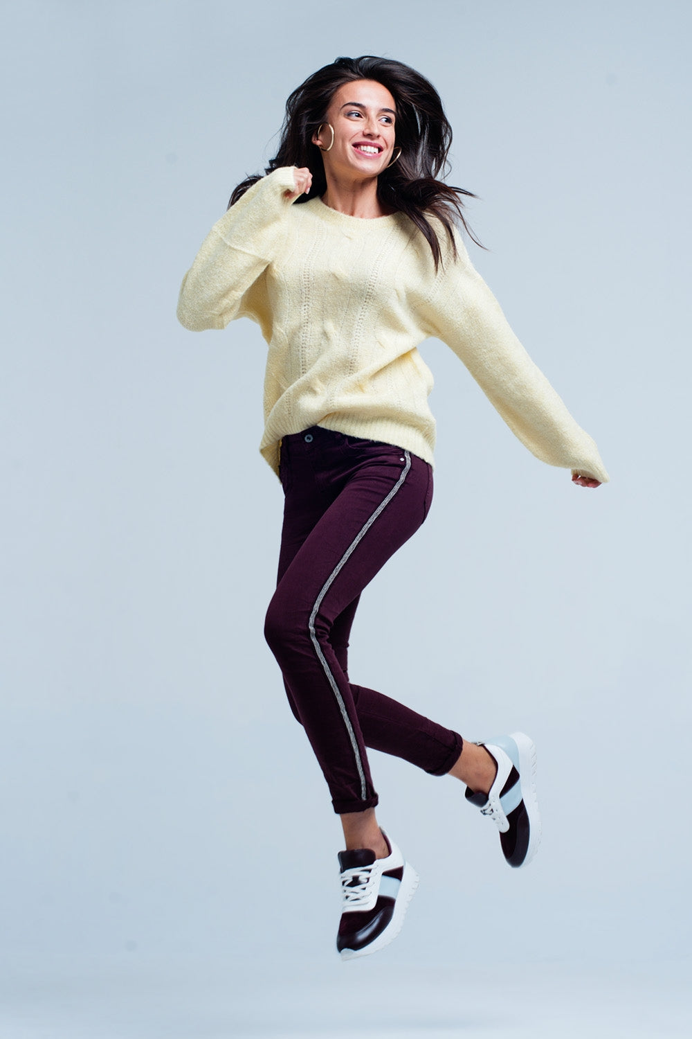 Jeans skinny con riga laterale metallizzata