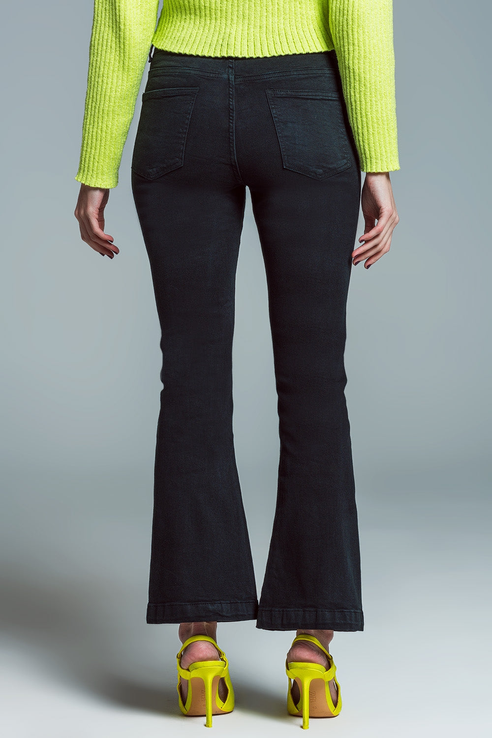 Jeans skinny svasati con doppio bottone in nero