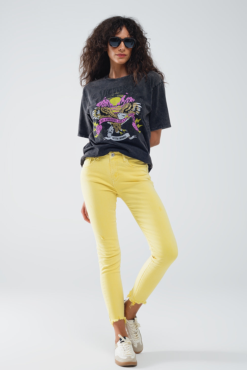 Jeans stretch super skinny gialli con orlo frastagliato