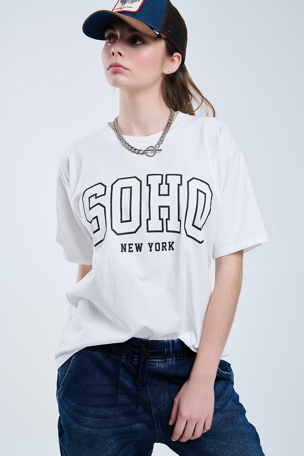 Maglietta bianca oversize con Soho New York sul davanti