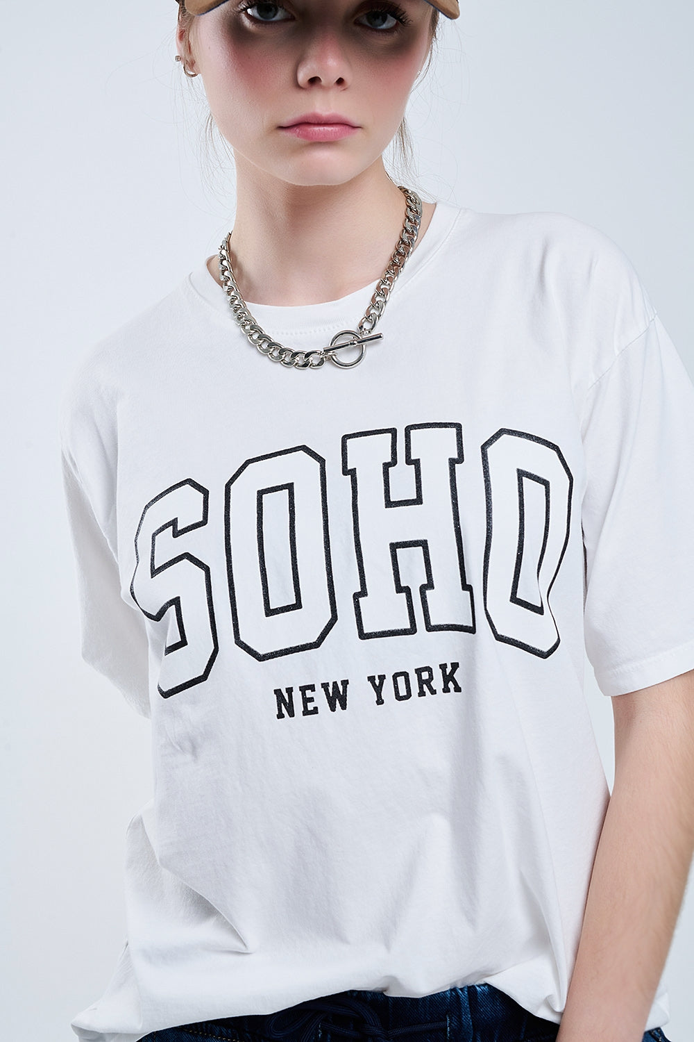 Maglietta bianca oversize con Soho New York sul davanti