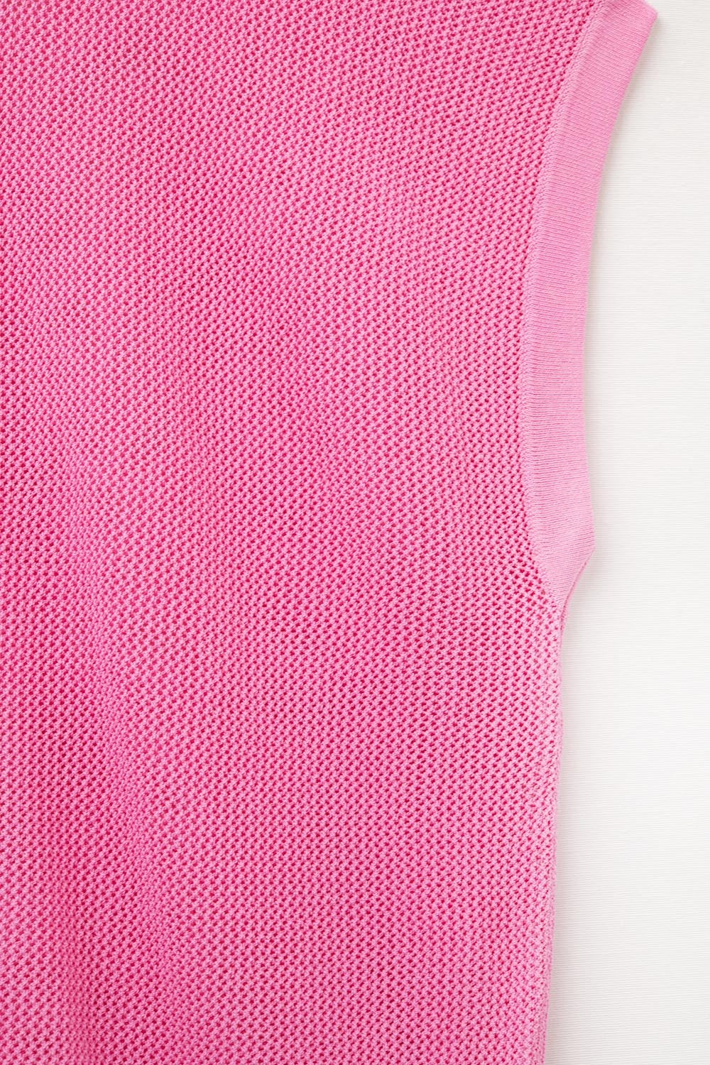 maglione a maglia a griglia di colore fucsia