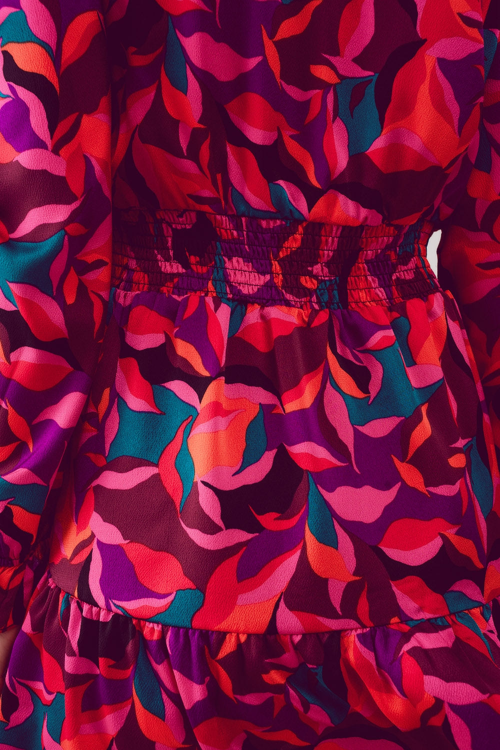 Mini abito fucsia con maniche a sbuffo