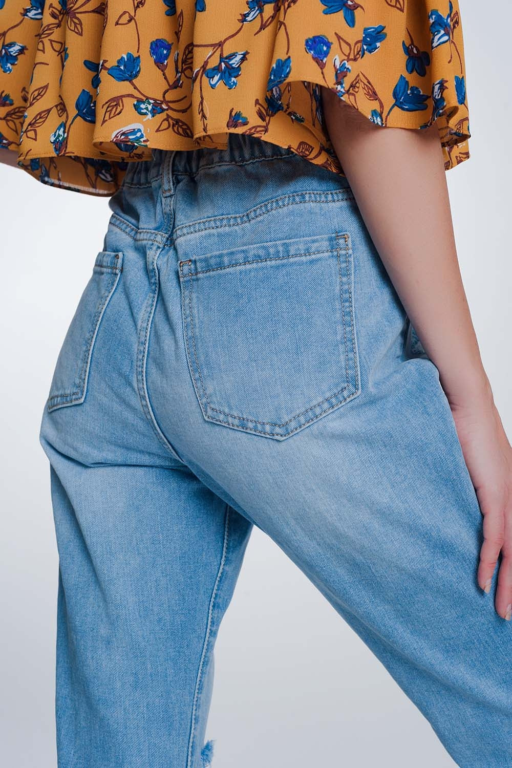 Mom jeans a vita alta con bottoni sul davanti