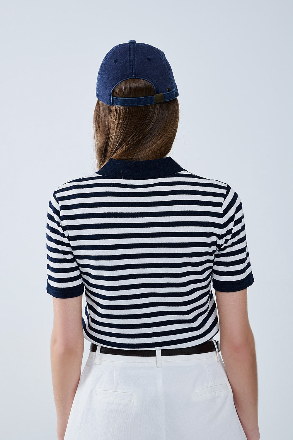 Polo in maglia a righe bianche e blu