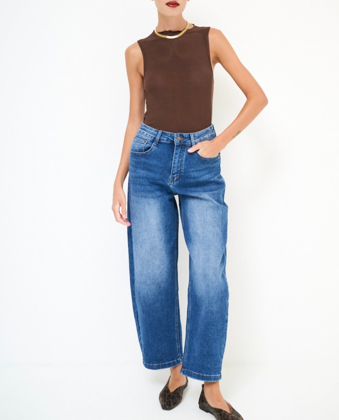Jeans gamba curvata