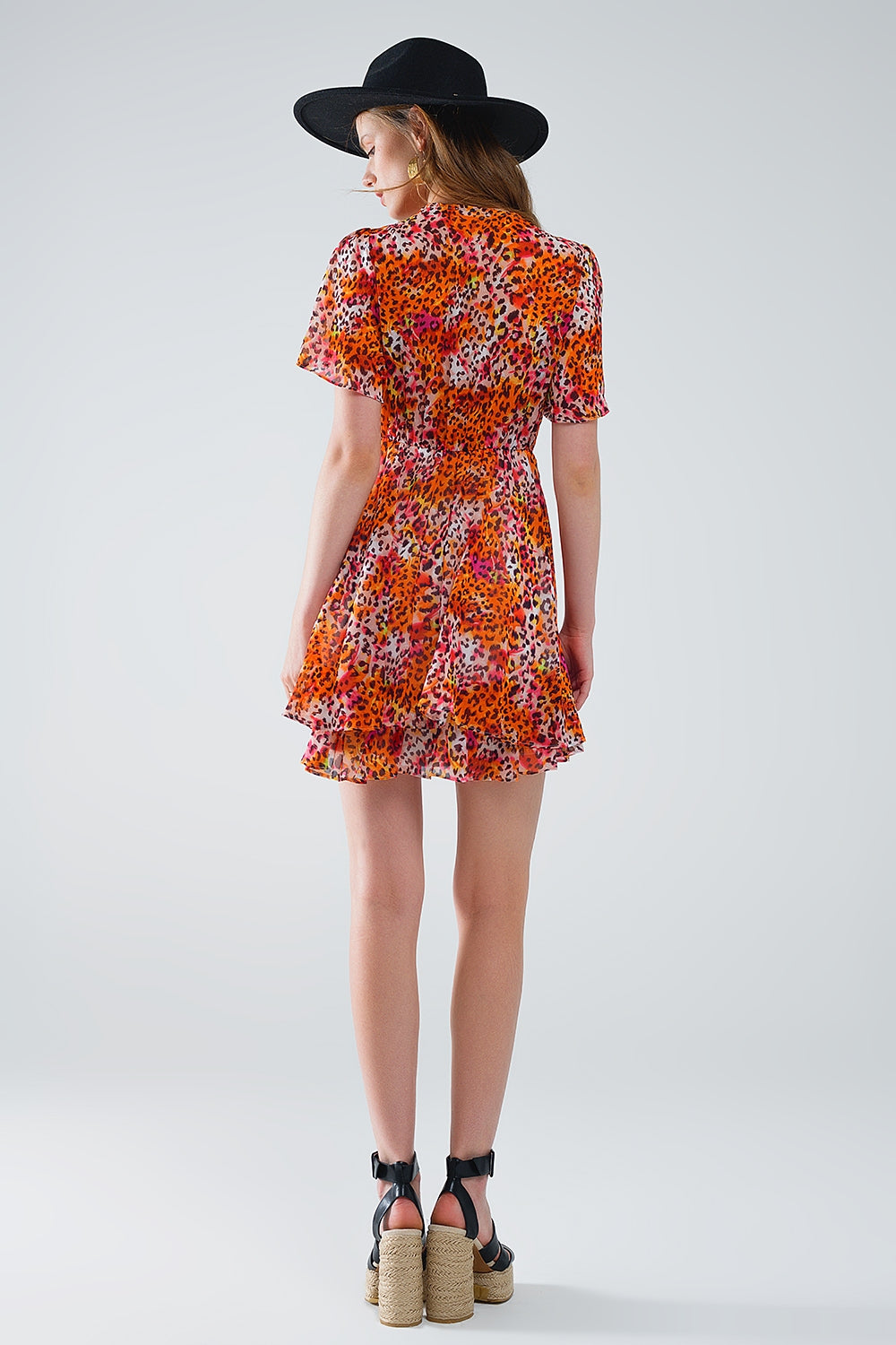 Vestito corto arancione multicolore con top incrociato con stampa animalier