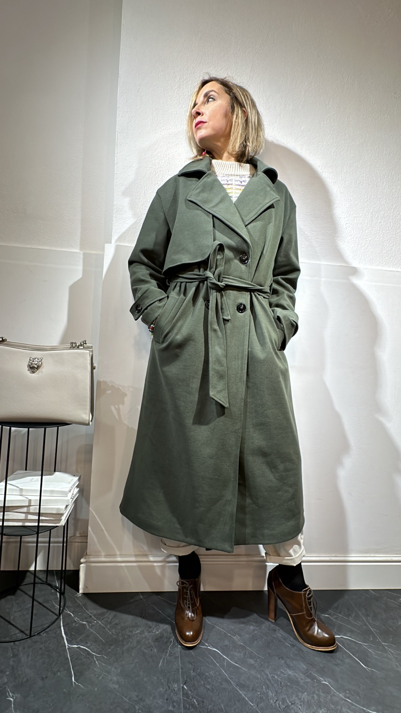 Cappotto verde modello trench