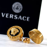 VERSACE Orecchini neri e oro Medusa