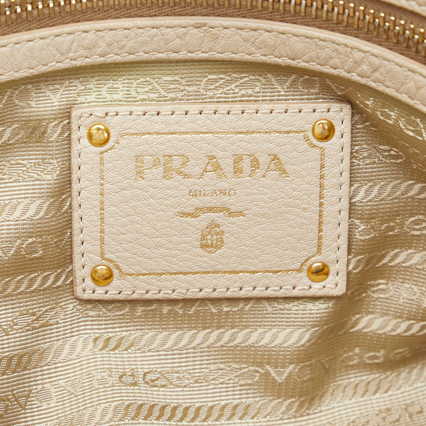 PRADA borsa panna con tracolla pelle martellata