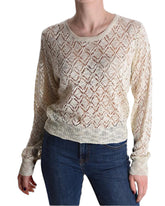 Maglioncino traforato lurex crema