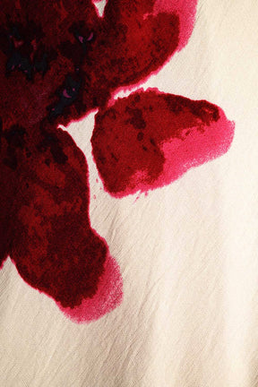 Abito lungo rosso senza maniche con stampa floreale