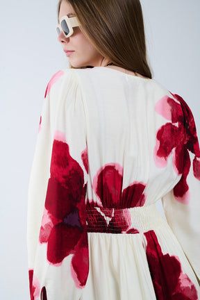Abito midi beige a portafoglio con stampa floreale tropicale rossa e maniche lunghe