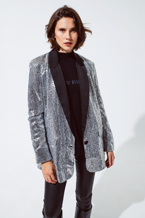 Blazer da smoking in paillettes argento con revers in raso nero