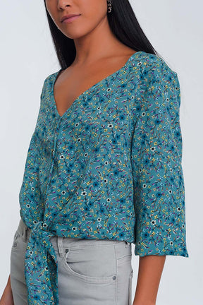 Blusa a maniche lunghe con scollo a V bottoni e stampa a fiori  verde