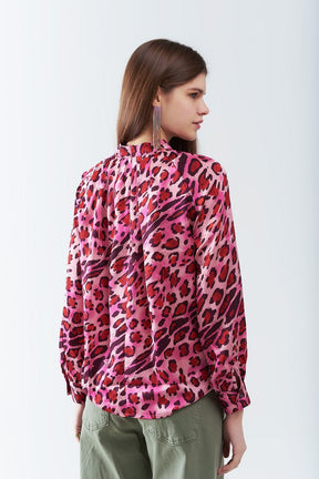 Blusa a Maniche Lunghe in Stampa Leopardata Fucsia alla Moda