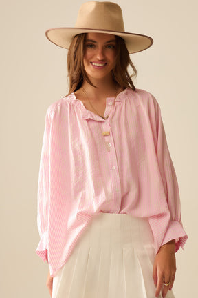 Blusa a righe con maniche a palloncino in rosa