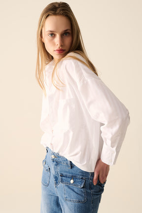 Blusa bianca a righe rilassata