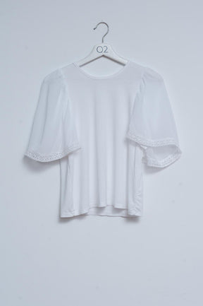 Q2 Blusa da giorno con maniche a pipistrello colore bianco