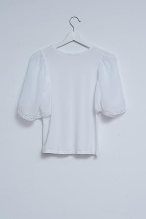 Blusa da giorno con maniche a pipistrello colore bianco