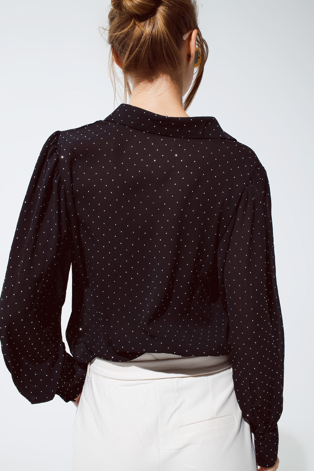 Blusa nera con dettagli strass