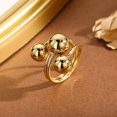Anello Dorato Spirale Tripla Sfera