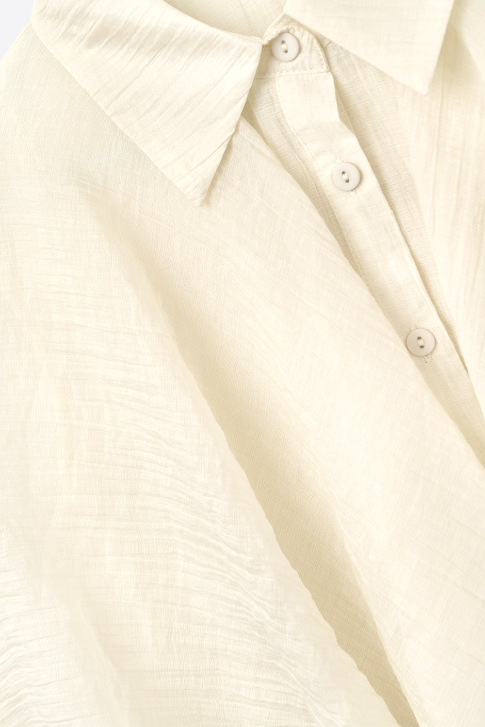 Camicetta in chiffon testurizzato beige con maniche scese