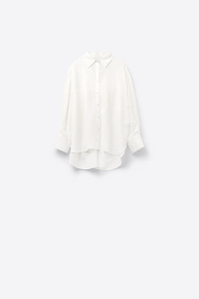 camicia bianca oversize con fiocco sul retro