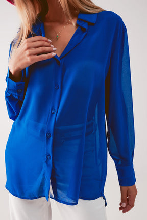 Camicia blu in chiffon trasparente