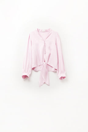 Camicia cropped in rosa con nodo