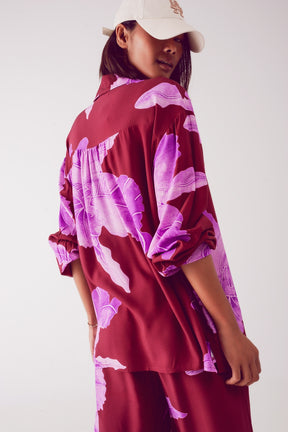 Camicia in raso fucsia con grande stampa floreale