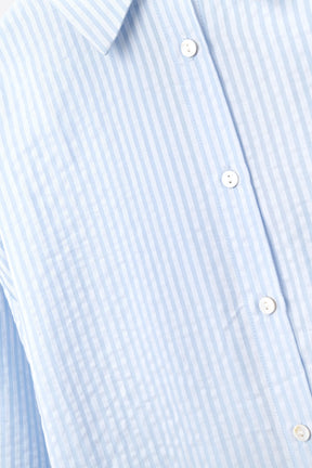 camicia oversize blu baby con fiocco sul retro