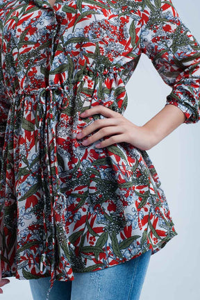 Camicia rossa con stampa di foglie e fiori