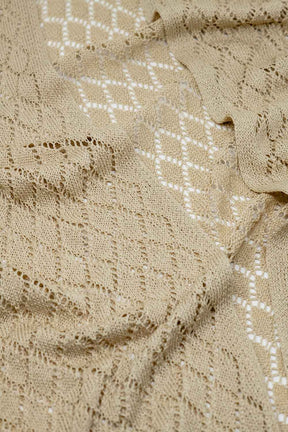 Cardigan aperto beige con frange e maniche a 3/4