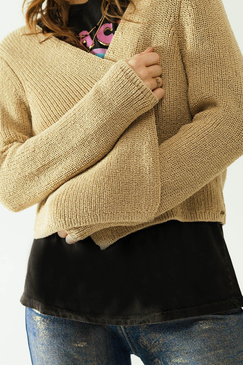 Cardigan corto aperto in maglia beige con maniche lunghe