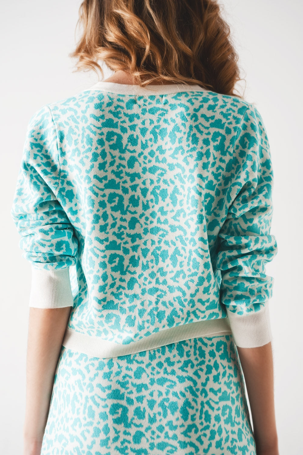 Cardigan leggero con stampa animalier turchese