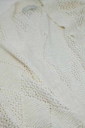 Cardigan lungo oversize in maglia argyle color crema