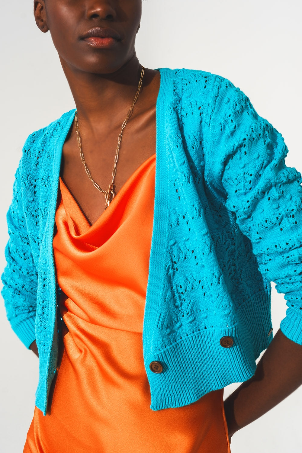 Cardigan traforato in maglia blu